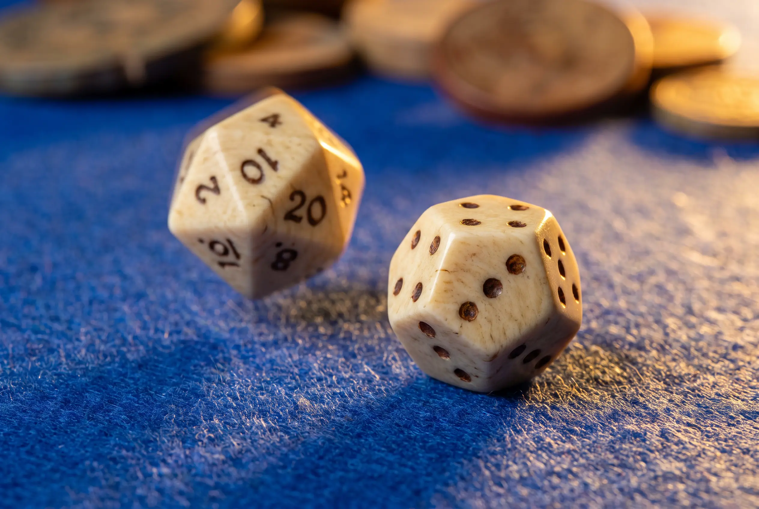 Dice on a cobalt blue game mat